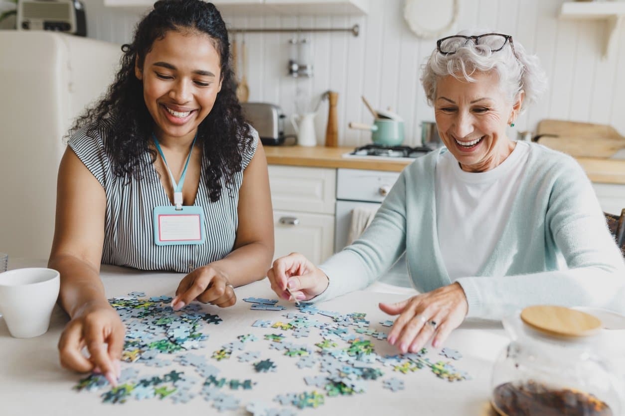Seniors and caregivers sharing a warm moment